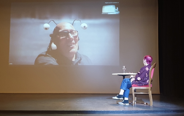 Adam Elliot and Nancy in conversation in the Apollo Theatre