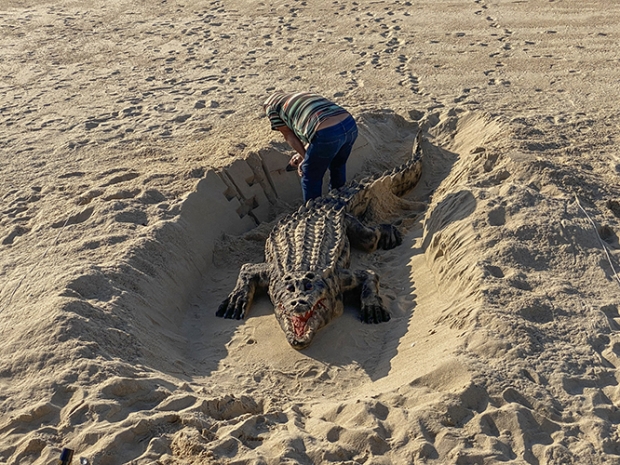 Sand Sculpture under construction on the beach